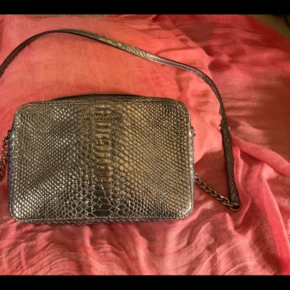 Michael Kors blue/silver handbag with leather and chain strap. Gently used.